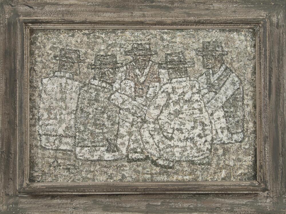 Image of five men wearing white clothing and black hats. They are all either seated or crouching in a circle. Very textured surface with frame that is part of the piece. Colors of greys, whites, browns and blacks.