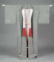 <p>light green gray and white repeating patterned (komon) chirimen kimono with various motifs arranged in a checkered pattern with a red and light pink inner lining.</p>
