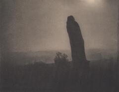 This photogravure is one of a series of photographs by Edward Steichen commissioned by Auguste Rodin of his statue of the French writer Honoré de Balzac. Created at 4:00 a.m., a cloaked and silhouetted figure stands in a misty landscape. 
