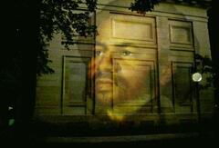 15-minute video projected onto a building