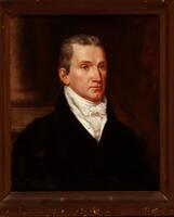 Bust length portrait of caucasian male, light colored eyes, greying brown hair pulled away from face. Wearing a black jacket with sizable white cravat. Set against brown backdrop, resembling empty wooden shelving above sitter&#39;s right shoulder. (Larson 2/5/18)&nbsp;