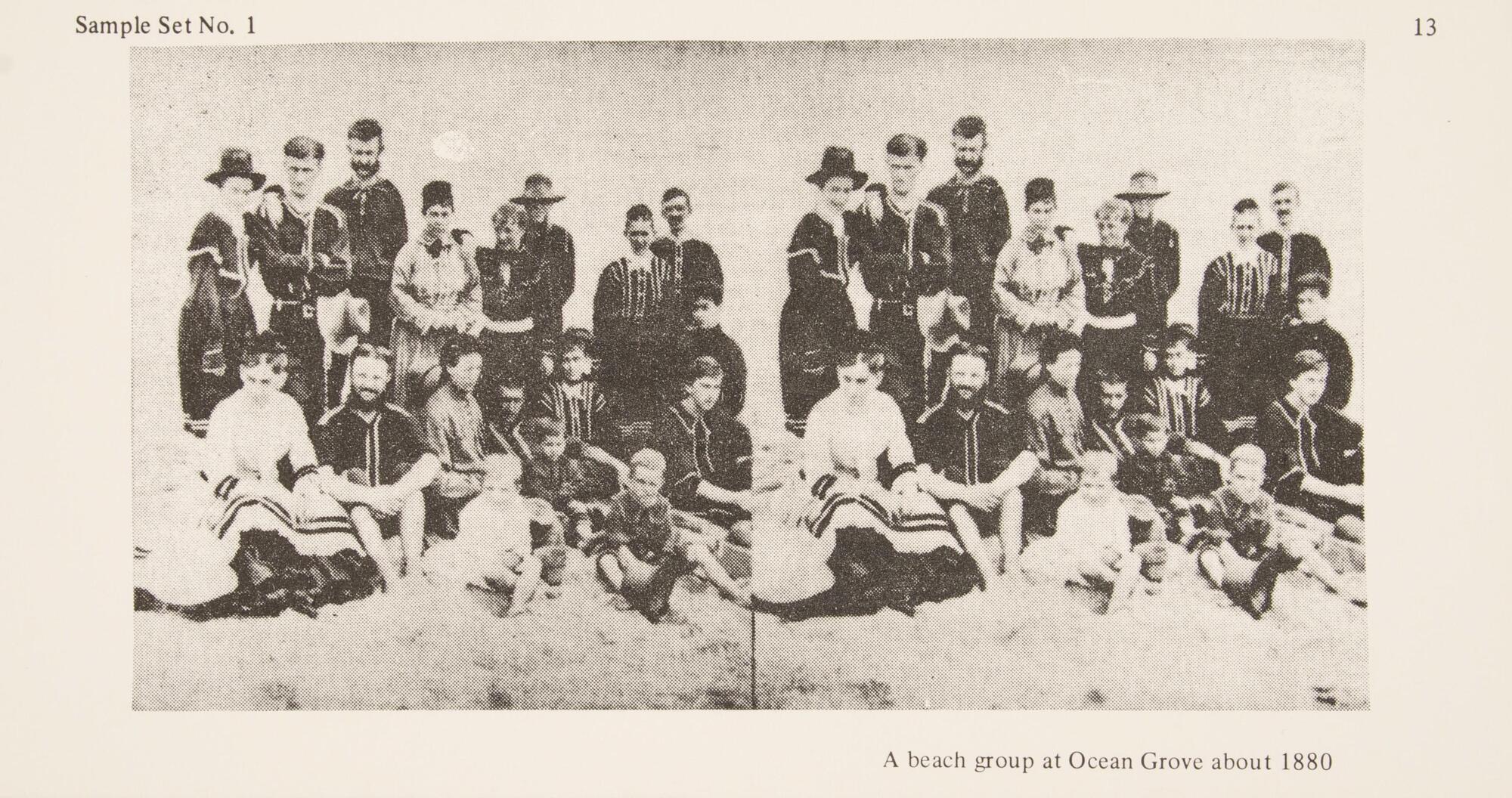 This black and white stereoscopic image features two images of a view of adults and children grouped in the sand on a beach.  It is surrounded by the text: Sample Set No. 1; A beach group at Ocean Grove about 1880.<br />