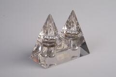 A two-bottle inkwell shaped to look like two square pyramids.