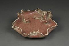 Peachbloom water coupe with scalloped edges and motifs of lotus leaf, frog, and dragon fly.