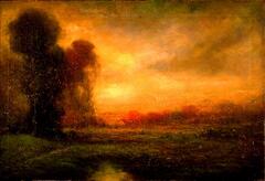 This painting shows a landscape with a distant horizon and trees on the left hand side. The evening sky is depicted with yellows, oranges and greens. The painting is signed and dated (l.l.) "H.M. Kitchell / 1910".