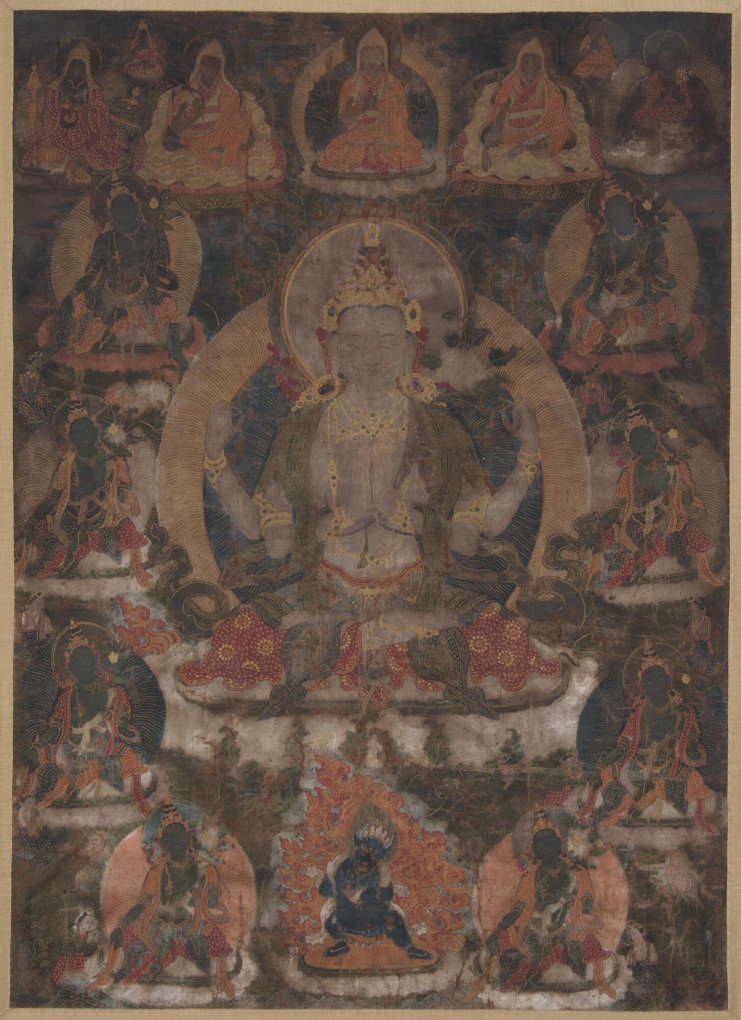 A silk hanging scroll with images of members of a pantheon of gods.
