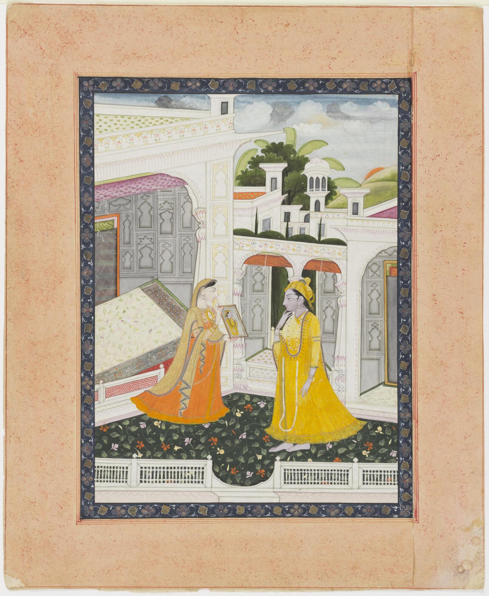 Radha and Krishna stand facing each other in the courtyard of an ornately decorated white building, which is situated amidst other white structures. Radha holds a mirror and Krishna gazes at it. Krishna's reflection can be seen in the mirror. The painting is placed on an orange background and within a vegetal border.