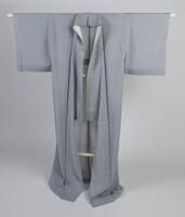 <p>Plain pale blue Iromuji Ro kimono with one kamon (family crest) with no inner lining (hitoe).</p>
