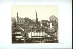 Photograph of several gravestones in the cemetery in Lucknow, India.