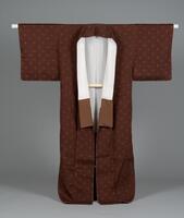<b id="docs-internal-guid-13c7dd0c-7fff-468f-9d22-1142b7bdc1f9">Red-brown tsumugi kimono with interwoven light brown hijiki (weaving shuttle) motifs with a silk white and brown lining.</b>