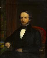 Portrait of a man in a red chair, books on the left side.