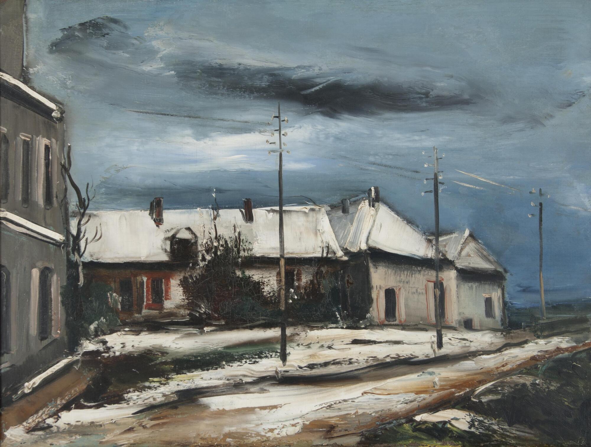 A street scene with a darkened sky and long buildings. There is snow and dust on the roads, telephone poles leading into the far distance and a low horizon line.