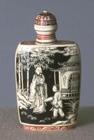 An ivory rectangular snuff bottle with a painted black and white narrative scene on the front surface. There is an older man and a younger boy standing in front of a house and bamboo forest. On the ground surrounding them are plants and piles of rocks. Above them in the sky are clouds. The top of the snuff bottle, mouthpiece, stopper, and footing have red and white stripes or designs on them.