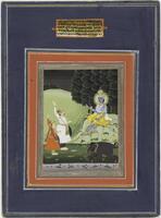 The Hindu God Krishna, holding a sword and an elephant tusk, sits on an elevated surface. An elephant with its trunk cut off is shown below him. Two men appear to be paying deference to Krishna with their raised hands. It is nighttime and they seem to be in a forest/ field. A short verse is painted above the depicted scene.