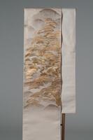 <p>Beige Fukuro (double-sided) Obi with an interwoven and painted silver and gold landscape with a with silver and gold embroidery.</p>
