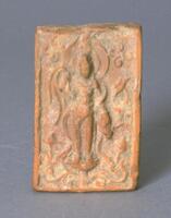 A portable icon featuring Guanyin. She is standing in a walking position and is carrying a willow branch and vase.