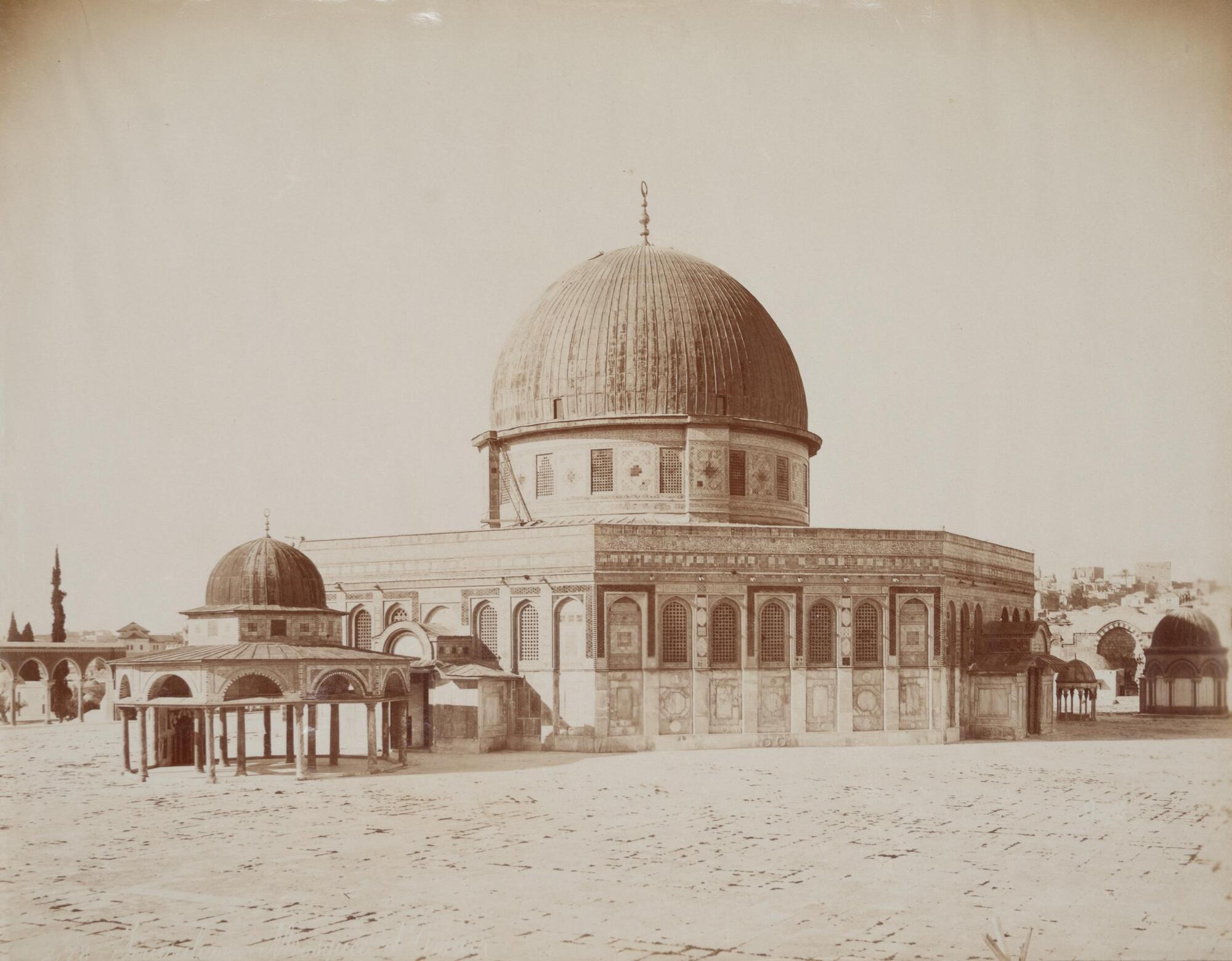 View of an octagonal building with central cupola surrounded by smaller domed structures.