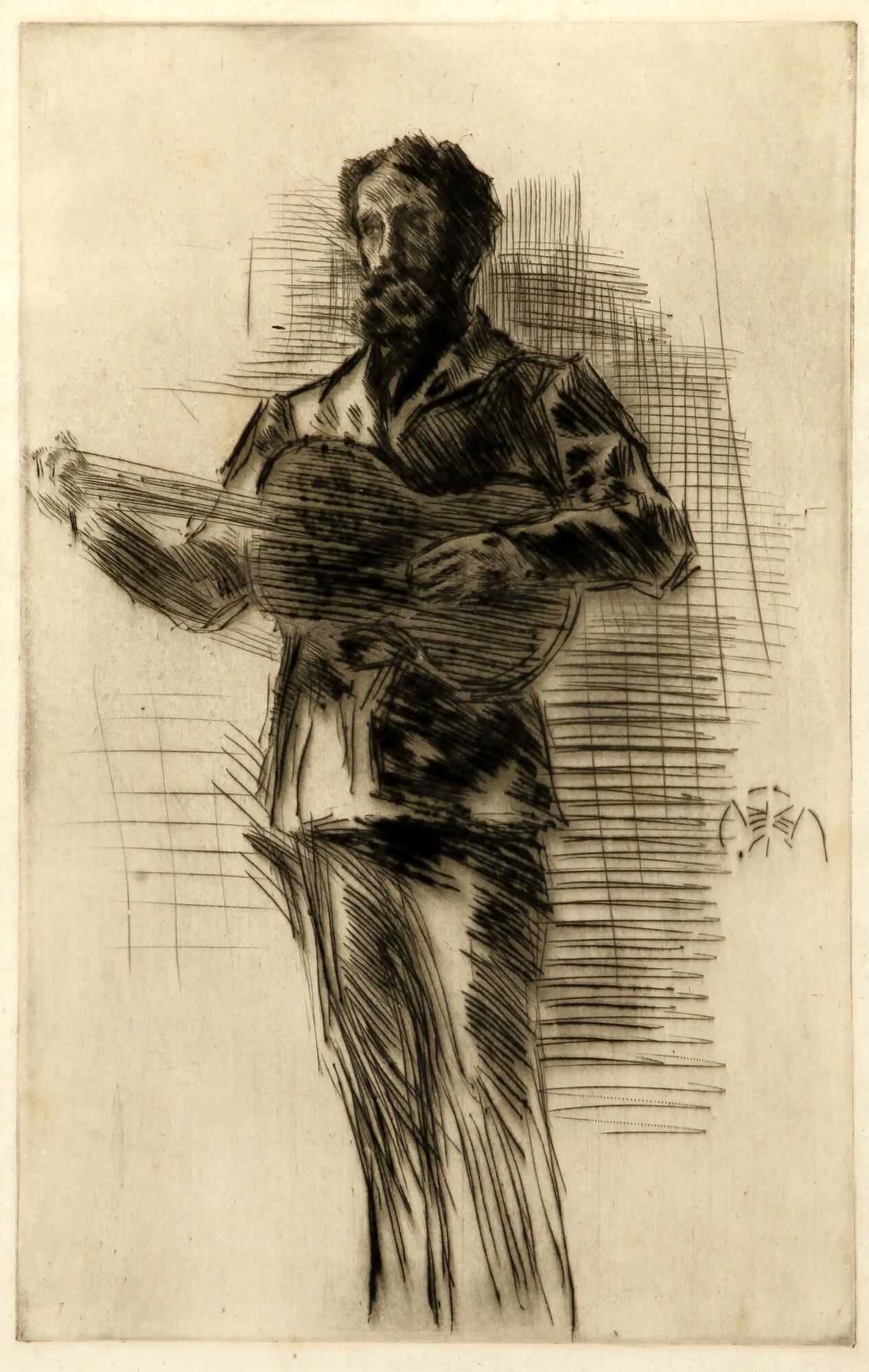 A man with moustache and beard stands facing slightly towards the left, strumming a guitar.