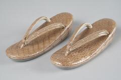 Light brown alligator print with double straps, also in alligator print.