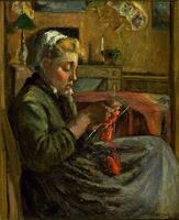 A girl seen in profile sits, knitting something red. There is a table beyond her and a fireplace with a fan above on the wall on the right side.