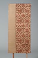 <p>Textured light brown Fukuro (single sided) obi with a repeating interwoven dark red floral damask pattern.</p>
