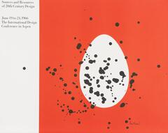 A graphic featuring a white egg shape against an orange-red background, with large dots of black splattered across it. The left 5th of the sheet is white, with text related to the International Design Conference in Aspen appearing in the top left.