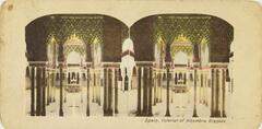 This color stereoscopic image features two images of an interior of room with multiple yellow tinted columns with pink capitals and frieze's and a green yellow embellishing towards the top.