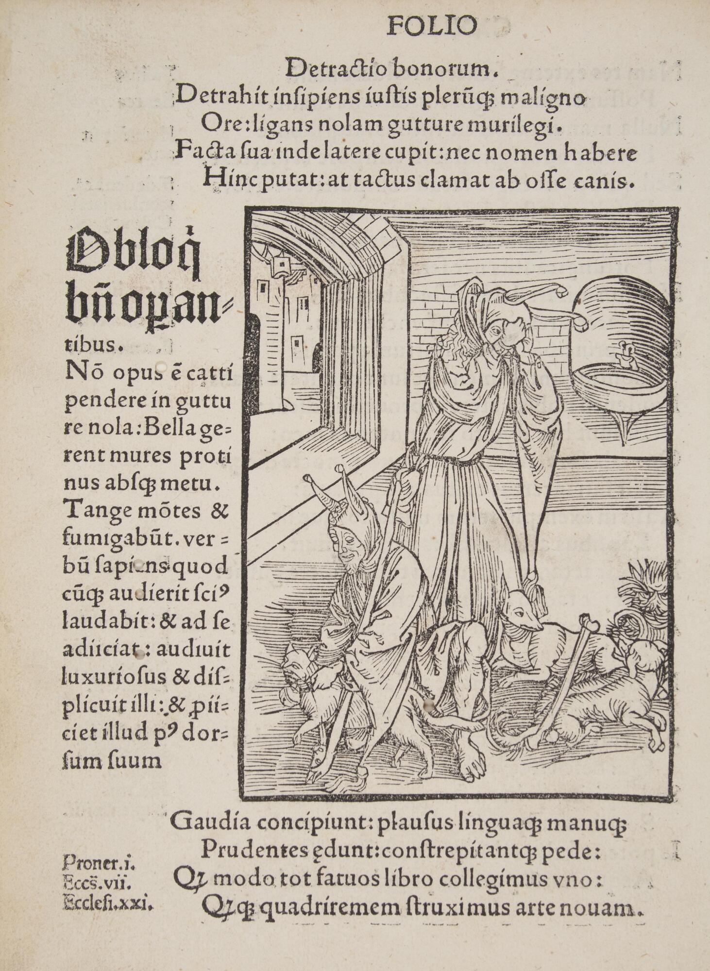 Text on both sides. One side has the image of a man with dogs at his feet. There is also a jester at his feet, kneeling down.
