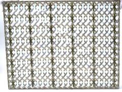 Abstract design within a rectangular metal frame consisting of vertical glass rods of milky white and smoky greenish glass. Holding those rods in place are diagonally-woven silvered flat metal strips.
