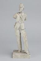 Plaster sculpture of a man dressed in a Civil War military uniform; arms are broken off at mid-bicep.  <br />