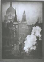 This photograph depicts an elevated view of the atmosphere above the city of London with St. Paul's Cathedral in the background. The image focuses on a plume of smoke and spires on building tops.