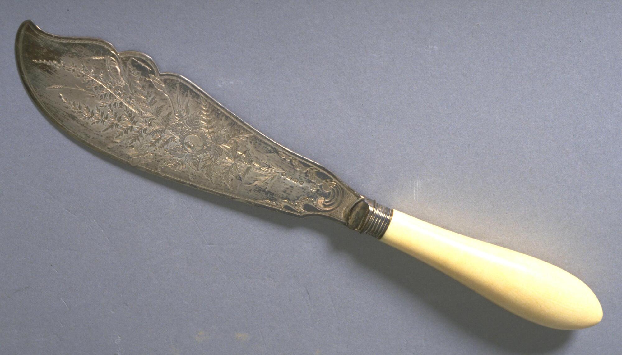 Knife engraved with leaf pattern and ivory handle
