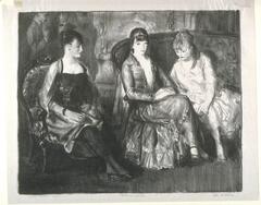 Three women in dresses sit side by side in an interior space. There are three men standing in the background on the left side.