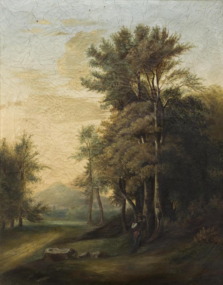 A man leaning against trees in a landscape scene. A mountain in the back and a trail beginning at the bottom left.