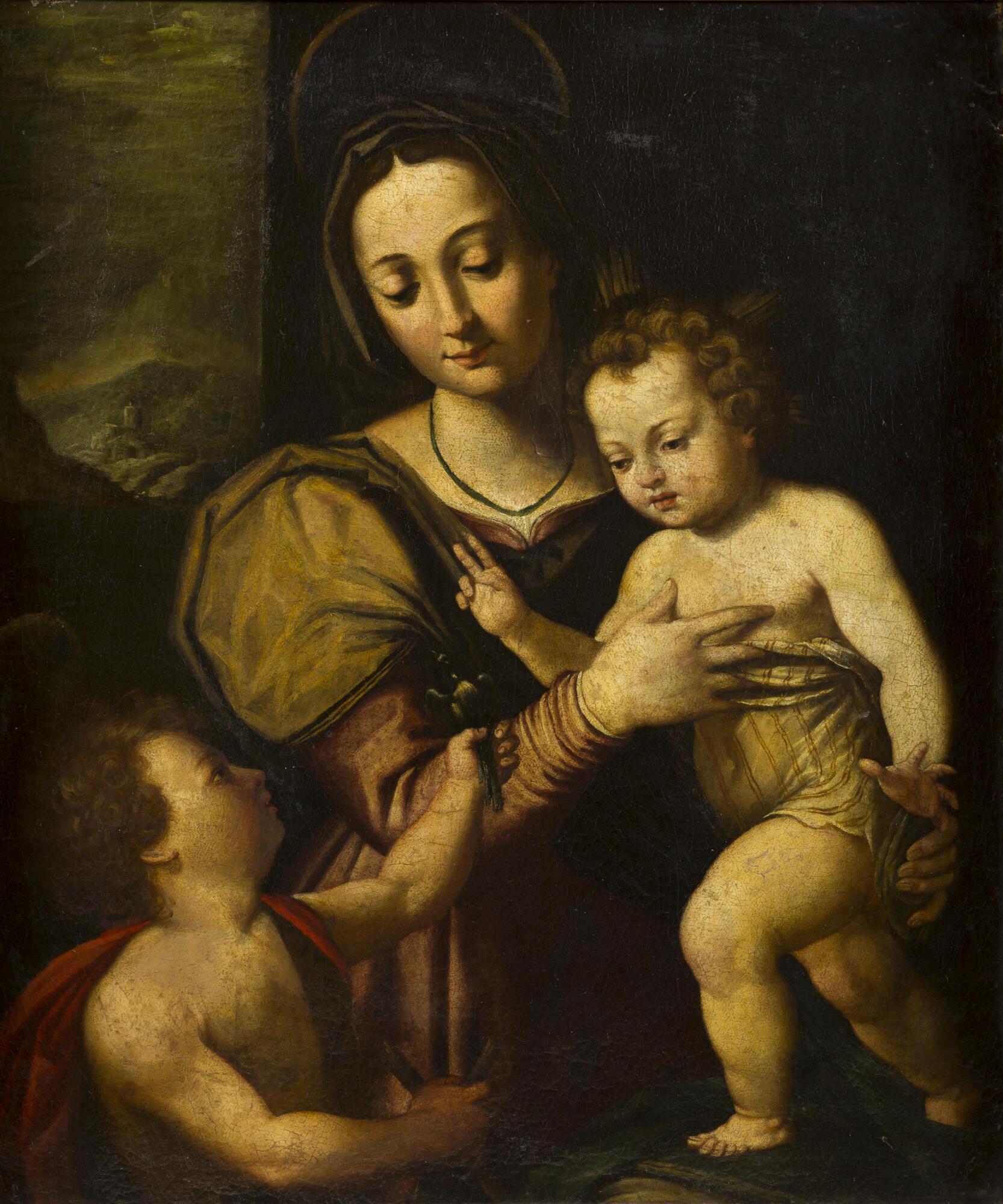 Three figures, one woman with two children, one is holding a bird.
