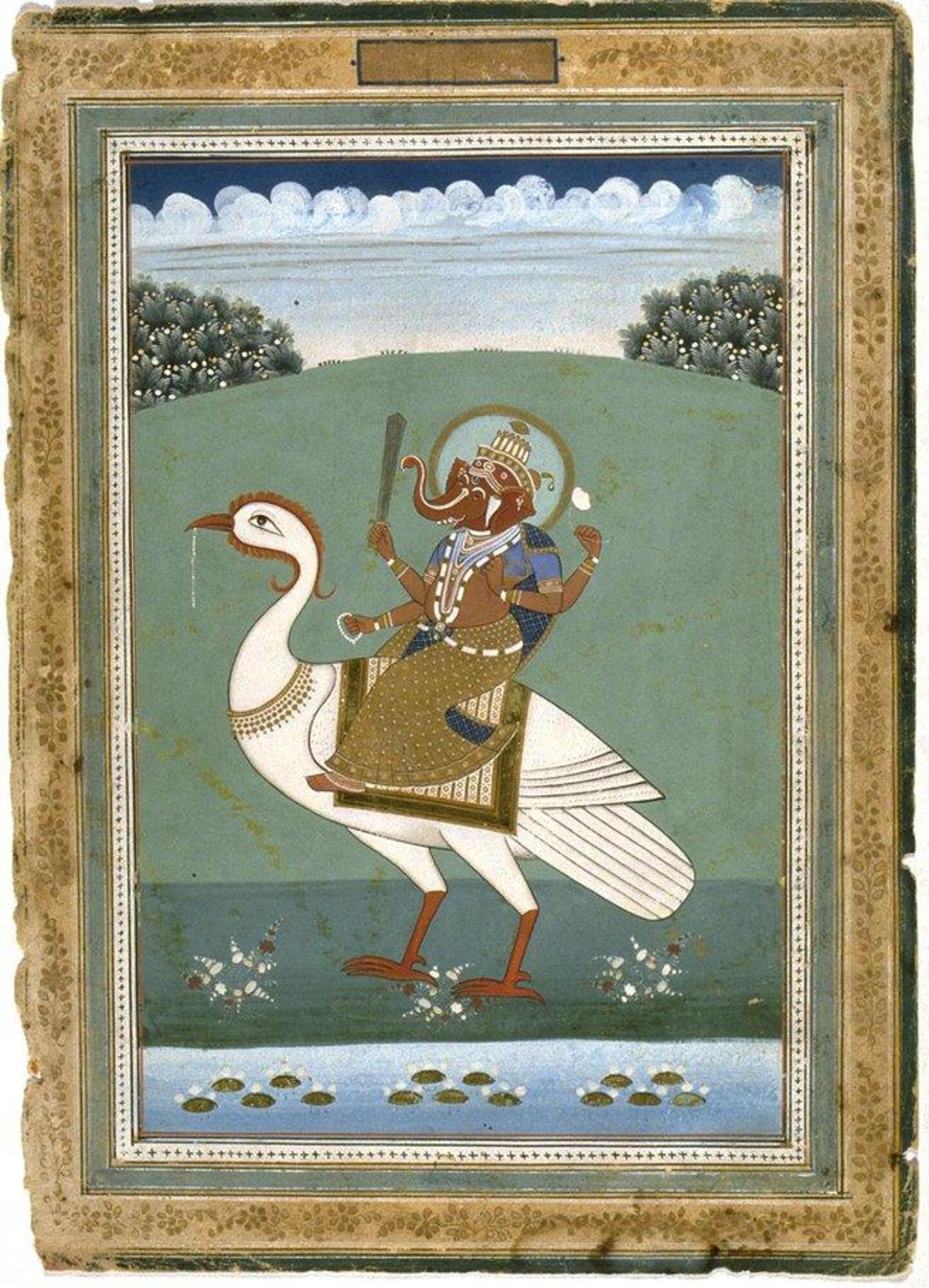 The Hindu God Ganesha sits atop a large white bird (a stork?). He holds the following objects in three of his four hands: a sword, lotus flower, and prayer beads. The stork also has a string of beads hanging from its beak. The landscape is plain and green, and a stream of water flows below.