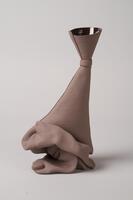 Second part of the hand built ceramic black color figure of a dancer.