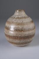 A short, globular vase with a very short neck and wide mouth. The ceramic is colored with alternating stripes of white speckles, browns of various shades and orange; a brown and tan matte glaze.