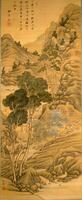 There are mountains lined with trees and houses; as you go further, they become smaller. There is a single tree that dominates the left side of the hanging scroll, blocking houses behind it. It stands upon one of the hills that line the coast of a river. There is an inscription in the top left of the hanging scroll as well as a signature and stamp in the top and bottom left of the scroll.