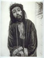 This is a photograph of a wooden sculpture from Huexotla, Mexico. The sculpture depicts a man with a crown of thorns.