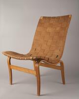 Wooden chair with arms, hemp webbing for seat and backing. Modern in form and style.