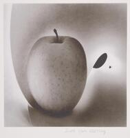 Apple wrapped in a piece of paper, creating a circular cone shape.