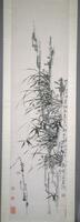 A hanging scroll in the ink bamboo tradition. The plant that is the focal point of the painting takes up the middle, while an inscription runs along the right side. Stamps are seen on the bottom of both the right and left side of the painting.
