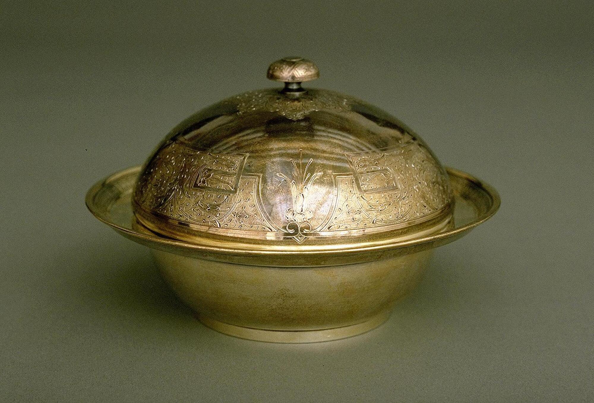 Silver bowl-shaped vessel with dome-shaped lid