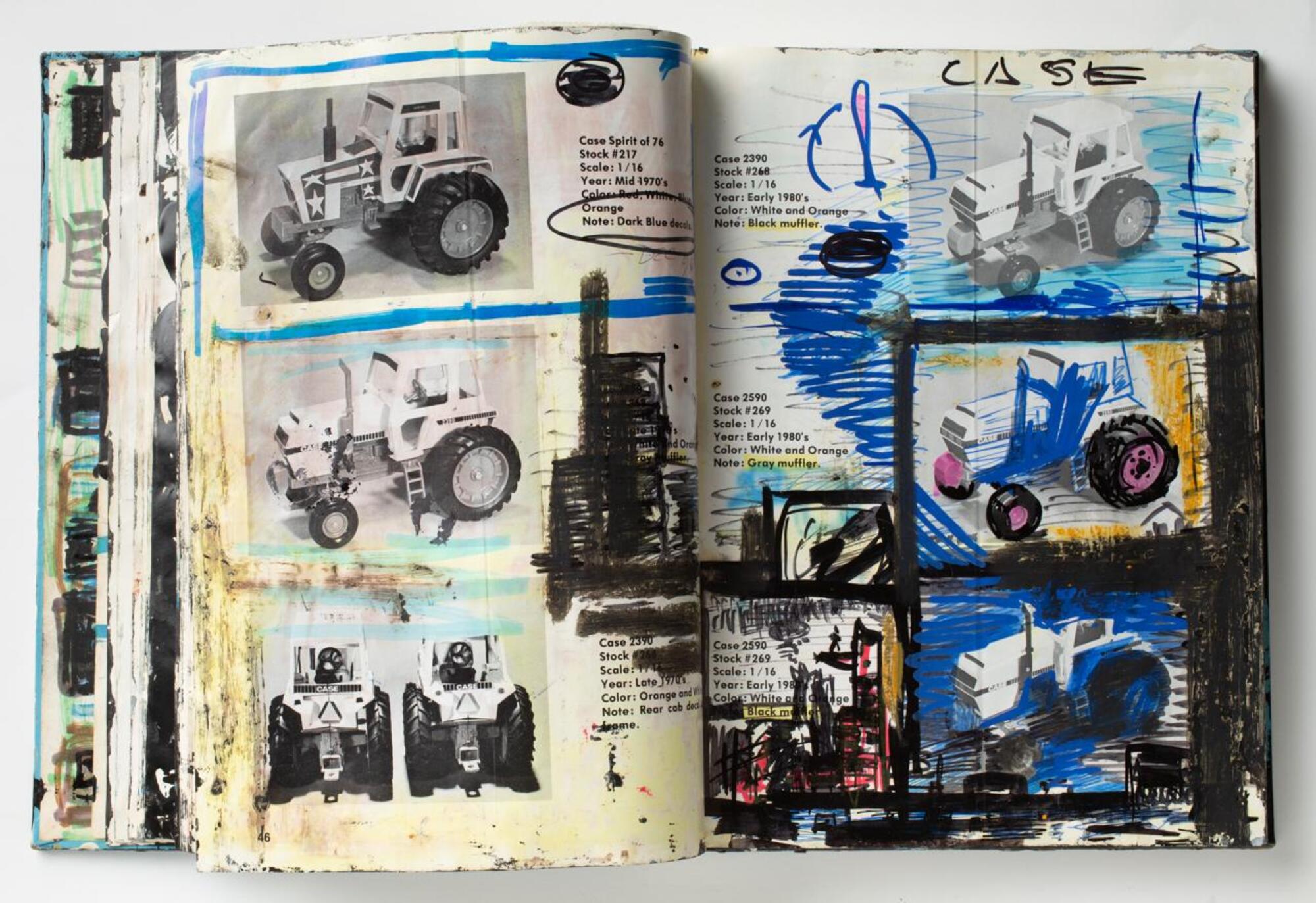 A book opened to pages displaying photographs of tractors, with tractor information listed next to each image. Black, blue, and red lines and areas of color are over and around the images.