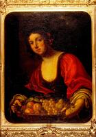 Woman holding a bowl of fruit, wearing red clothing and a red bow in her hair.