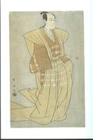 A man stands calmly looking to the left. He wears a formal sleeveless top (<em>kataginu</em>) and a matching, tan skirt (<em>hakama</em>). Underneath is an orange robe with white designs that match those on the skirt. He carries a sword at his side.<br /><br />
Inscriptions: Publisher's seal: Iwa; Signed: Shun'ei ga