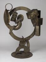 Abstract steel sculpture with circluar elements.