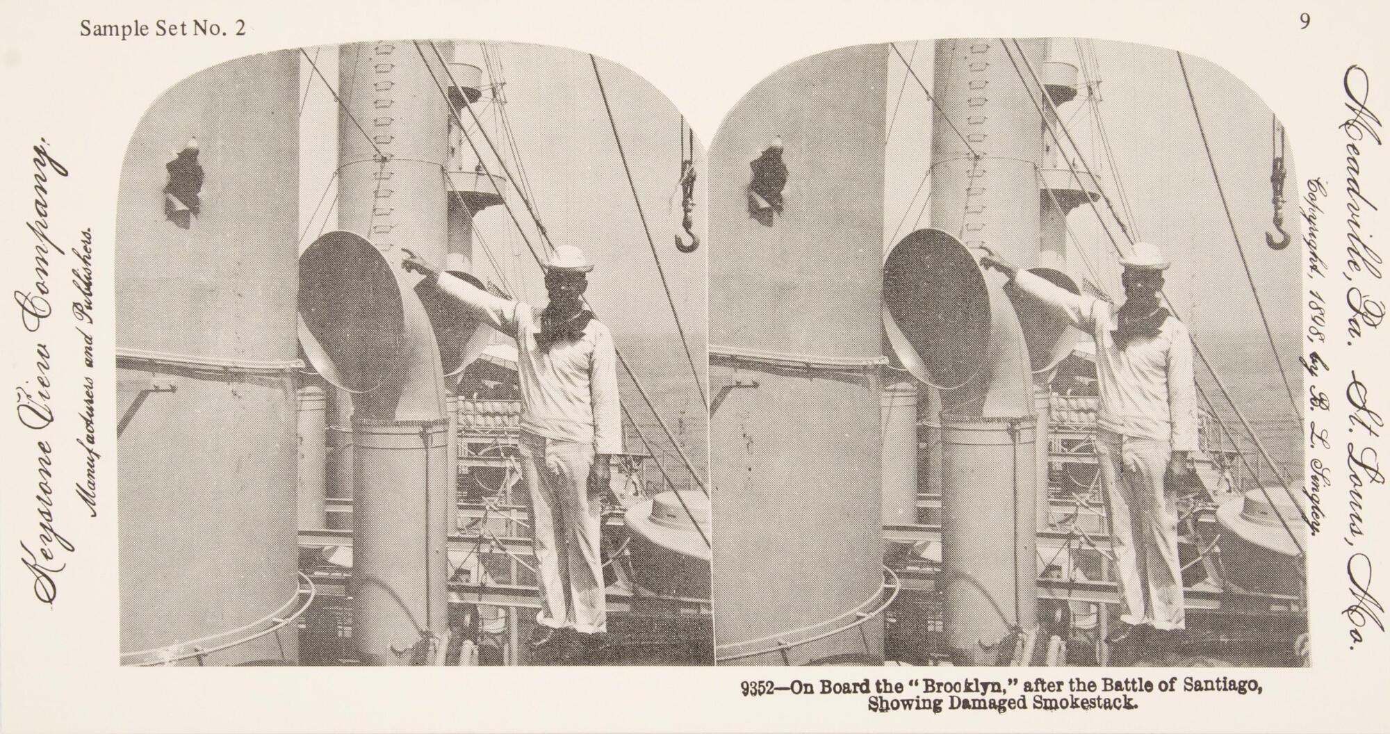This black and white stereoscopic image features two images of a man in a white sailor uniform pointing to a hole in a smokestack.