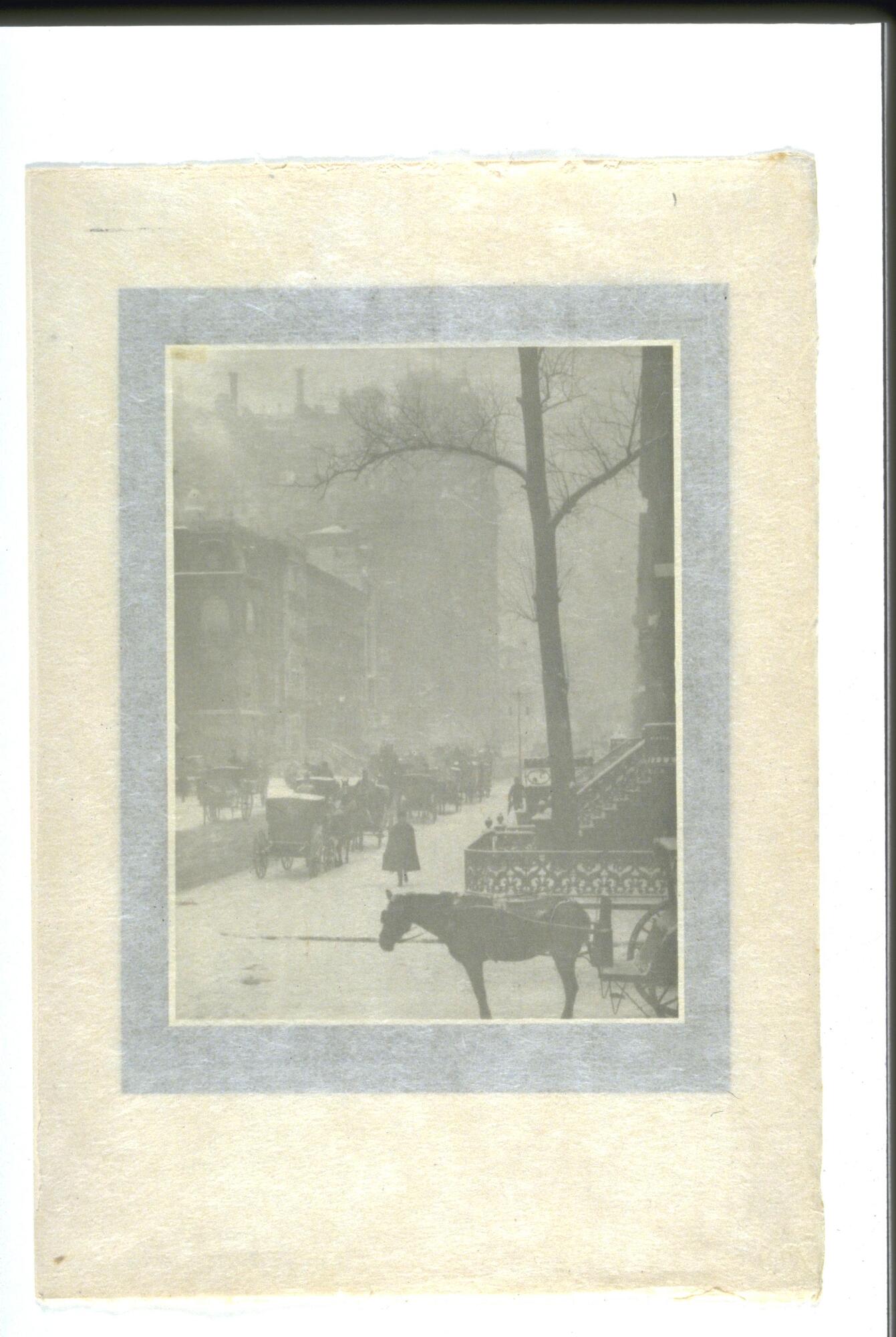 A winter city scene with figures walking on snow-covered streets and riding horse-drawn carriages. 